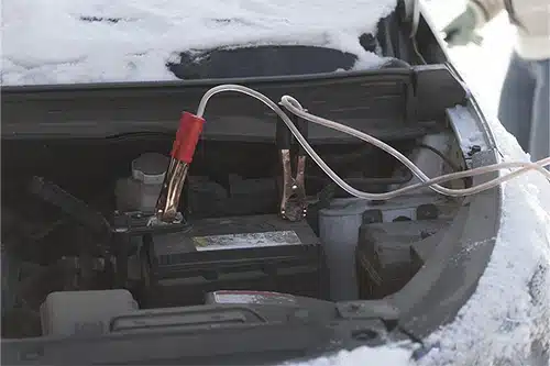 How Do I Keep My Battery Good in Winter? | Bock Auto in Amagansett, NY. Image of a car that did not start because of the cold temperature. The terminals are connected to the battery.